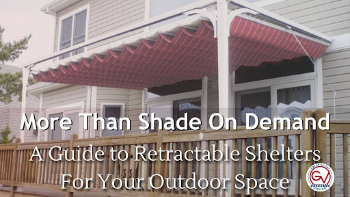 A red Sunesta retractable canopy providing convenient shade for an outdoor deck.
